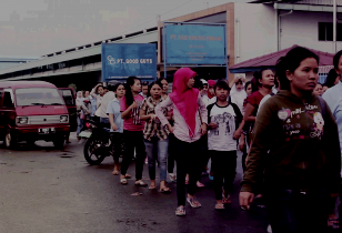Female workers on their way to work